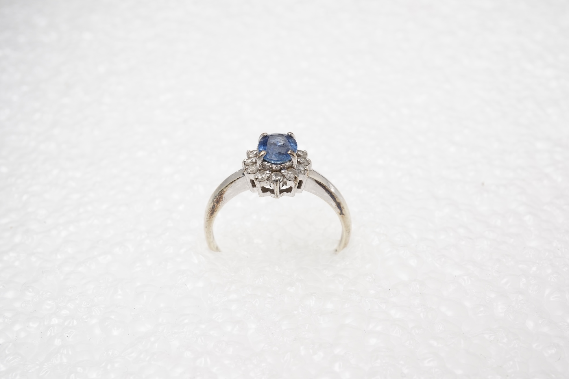 A sapphire and diamond cluster ring